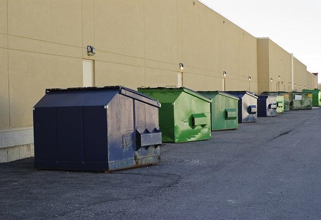 an empty dumpster ready for use at a construction site in Louisville